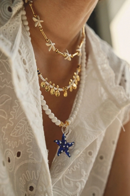Greca White